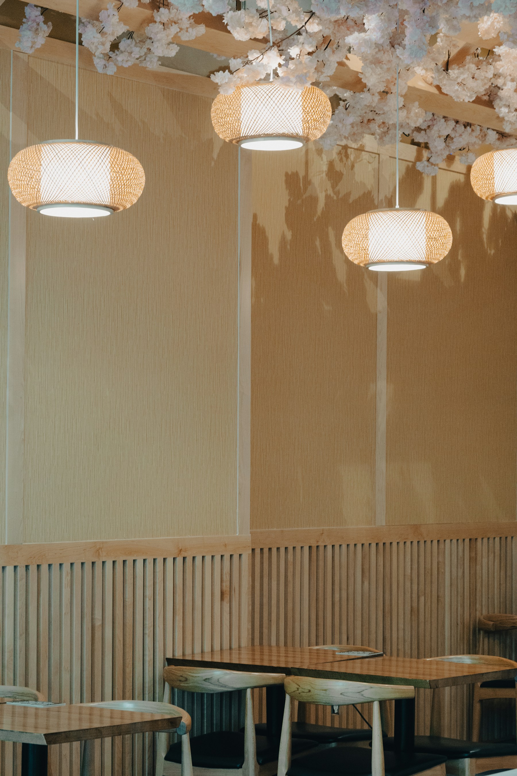 Warm Japanese-style restaurant interior with light wood